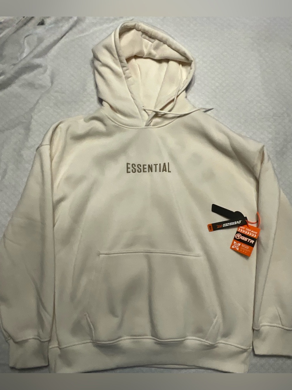 Essentials Cream Hoodie with Subtle Logo